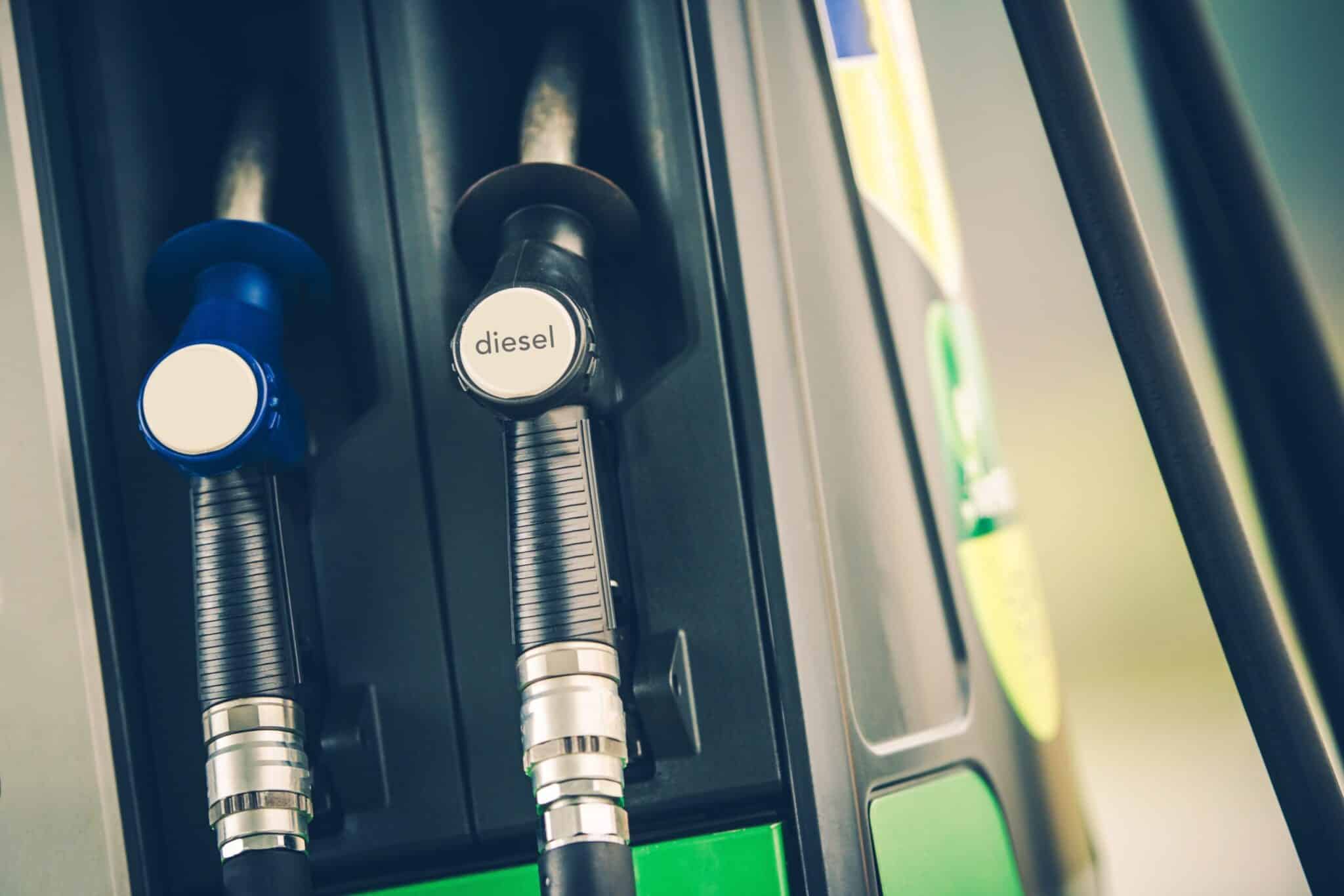 Gas Station Fuel Dispenser Closeup Photo. Car Refueling Concept Photo.